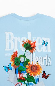 The PacSun Broken Hearts Club T-Shirt is a blend of casual comfort and bold style. With its crew neckline, short sleeves, and standard fit, this tee is adorned with puff graphics on the left chest and back, adding a unique touch to your everyday look.


	Crew neckline
	Short sleeves
	Standard fit
	Left chest & back graphics
	Machine washable Blue Summer Top With Heart Graphic, Blue Graphic Tee With Heart Graphic, Broken Hearts Club, Storm Reid, Broken Hearts, Club T Shirt, Sweatpants Shorts, Bold Style, Indie Brands