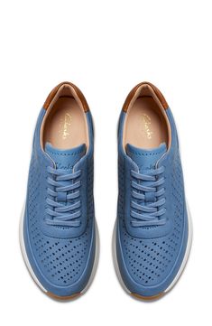 Shaped from buttery nubuck, this lightweight sneaker was built for comfort with breezy perforations, a shock-absorbing sole and Contour Cushion footbed. Lace-up style Removable insole Leather upper and lining/rubber sole Imported Blue Low-top Walking Shoes With Textured Sole, Comfortable Blue Leather Walking Shoes, Blue Low-top Leather Walking Shoes, Blue Leather Low-top Walking Shoes, Sporty Spring Walking Shoes With Perforations, Sporty Walking Shoes With Perforations For Spring, Casual Blue Leather Walking Shoes, Blue Sneakers With Perforated Toe Box For Spring, Blue Leather Walking Shoes With Ortholite Insole