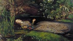 a painting of a woman laying on the ground next to a pond with flowers in it