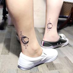 a woman's foot with a small tattoo on the left side of her leg