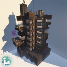 a very tall building with lots of windows and balconies on the top floor