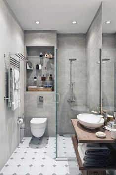 a bathroom with a sink, toilet and shower stall in the middle of it's walls