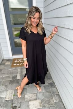 Wait until you feel how buttery soft this maxi dress is. Features a v-neckline, side slits and pockets. Model is 5'3" wearing a small 94% poly 6% Spandex hand wash or dry clean made in the USA! Black V-neck Maxi Dress With Side Slits, Black V-neck Midi Dress With Side Slits, V-neck Loungewear Dress With Side Slits, Black V-neck Midi Dress For Loungewear, Casual V-neck Dress For Everyday, Everyday V-neck Summer Dresses, Sweet Grace, Graphic Tee Dress, Ruffle Sleeve Dress