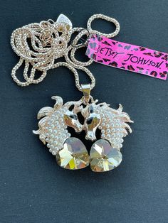 Sale is for a new old stock Betsey Johnson necklace. Pictures show the item on sale. Feel free to ask any questions. Expect normal signs of wear on all vintage/used items. Refer to photographs & description for item condition. Sale is final. Free shipping in the U.S. lower 48 via USPS. Thank you. Angel Wings Necklace Betsey Johnson, Necklace Pictures, Betsey Johnson Necklace, Horse Necklace, Betsey Johnson Jewelry, Betsey Johnson, Picture Show, Pendant Necklaces, Necklace Etsy