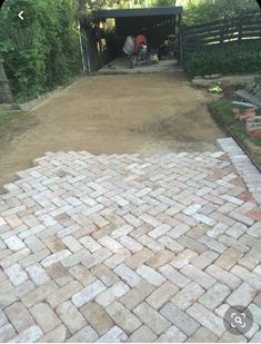 an image of a brick walkway being built