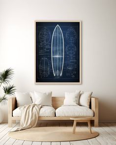 a living room with a white couch and blueprinted surfboard on the wall