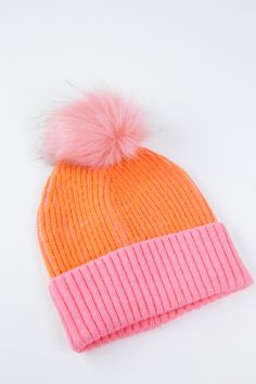 Add a pop of color to your winter wardrobe with this remarkable orange knit hat! Keep your head warm and your style on point with this cozy and cute Joy Knit Hat. Perfect for those winter days when you want to stand out! General Info: 42% Acrylic, 28% Nylon, 30% Polyester One Size Imported Orange & Pink Playful Pink Beanie, One Size Fits Most, Playful Warm Hats For Fall, Playful Pink Beanie (one Size Fits Most), Trendy Pink Fall Beanie, Playful Pink Beanie, Pink Knitted Beanie For Fall, Orange Beanie For Winter, Trendy Multicolor Winter Beanie, Trendy Multicolor Hats For Cold Weather