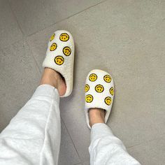 Spread Cheer With Every Step 🥰 Introducing our Mini Happy Face Slides Slippers, where comfort meets happiness in every stride. Designed to brighten your day with multiple small yellow happy faces, these slippers are the perfect choice to bring smiles wherever you go. Best Ladies House Slippers Add a touch of sunshine to your footwear collection with our Mini Happy Face Slides. Each step is a celebration with multiple small happy faces adorning the plush surface, bringing joy for everyone. Get r Slipper Shoes Women, Happy Faces, Slides Slippers, Reindeer Headband, Slide Slippers, Buy 1 Get 1 Free, Black And White Prints, Women's Slippers, Footwear Collection