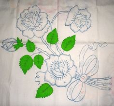 two napkins with flowers and green leaves on them