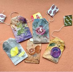 small bags with fruit and vegetables painted on them