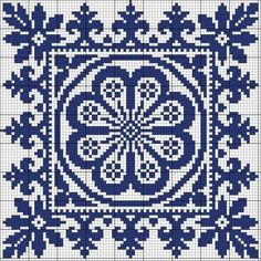 a cross stitch pattern in blue and white with an intricate design on the bottom half