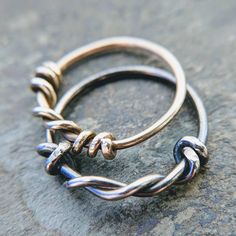 So simple, and just different enough. I form these rings by wrapping the wire around itself and hammering, filing and tumbling to take off the edges. This is a very raw ring, wearable everyday. The more it's worn the more character it gets. I make them for me, but they fly off my fingers as friends admire them. Sizing is approximate. If you aren't sure about sizing, you can give me the measurement of your own ring's inside diameter in millimeters, from inner wall to inner wall across the widest Raw Ring, Silver Ring Simple, Minimal Ring, Silver Rings Simple, Ring Simple, Twist Ring, Gold Filled Ring, Ring Minimalist, Minimalist Ring