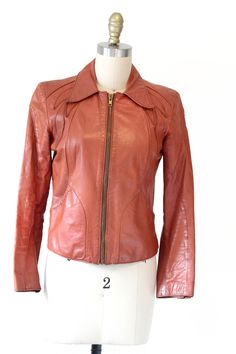 "COOL VINTAGE BROWN LEATHER JACKET. LABEL - CRAC CARIYLC SAN FRANCISCO MADE IN TAIWAN      CHECK MEASUREMENTS. ZIPPER VERY GOOD CONDITION. SHOWS LIGHT GENERAL WEAR HAS ORIGINAL ZIPPER AND LINING. SIZING: (when laid flat) SHOULDER TO SHOULDER: 15\" BUST: 17\" BOTTOM: 15 1/2\" SLEEVE LENGTH: 21 1/8\" SLEEVE OPENING: 4 1/2\" POCKET OPENING: 5\" TOP TO BOTTOM LENGTH (FROM COLLAR FOLD): 22 1/2\" WAIST: 16\"" Spring Retro Leather Jacket With Zipper Closure, Spring Retro Leather Jacket With Zipper, Vintage Spring Outerwear With Zipper Closure, Vintage Leather Jacket With Zipper For Work, Retro Fitted Biker Jacket For Fall, Fitted Long Sleeve Vintage Brown Biker Jacket, Fitted Vintage Brown Long Sleeve Biker Jacket, Vintage Brown Fitted Long Sleeve Biker Jacket, Fall Fitted Vintage Brown Leather Jacket