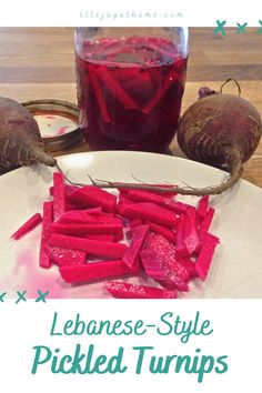 beet pickled turnips on a plate next to a jar of lemonade