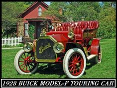 an old model t tourer is parked in the grass