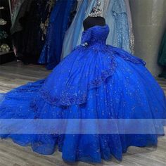 a blue ball gown on display in a store