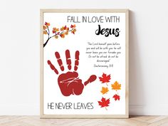 a poster with the words, fall in love with jesus and handprinted leaves