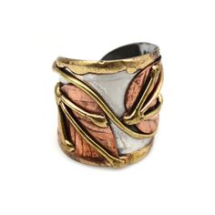 Stainless steel, copper, and brass adjustable cuff ring. Unique Bronze Metal Ring, Artsy Gold Copper Jewelry, Unique Gold Copper Rings, Unique Gold-colored Copper Rings, Adjustable Gold Fusion Rings, Unique Bronze Open Ring Jewelry, Bronze Copper Open Ring Jewelry, Bronze Copper Open Ring, Artsy Hand Forged Copper Jewelry