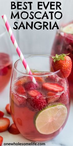 the best ever moscato sangria with strawberries and limes in glasses