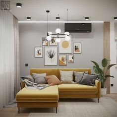 a living room with yellow couch and pictures on the wall