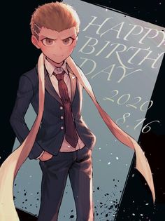 a man in a suit and tie standing next to a sign with the words happy birthday on it