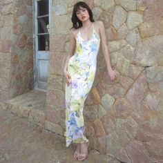 Features: Indulge in effortless style with our Sexy Backless Floral Print Slip Maxi Dress. Perfect for beach vacations or summer outings, this dress features a stunning floral print, sleeveless design, and elegant backless detail. Stay cool and chic all season long with this must-have addition to your wardrobe.