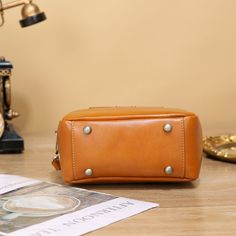 MATERIAL - Made of 100% high quality vegetable-tanned leather, solid color,feels cosy to touch,delicate, durable. The hardware parts are made of cast molding thick hardware, top metal hardware. The stitching is well-made, firm and smooth.DIMENSIONS - 8.3L*3.5W*5.9H(inch) / 21L*9W*15H(cm).STRUCTURE - This crossbody bag contains 1 main compartments, 1 inner slip pocket, 1 inner zipper pocket. Comfortably holds wallet, mobile phone, cosmetics, keys, charge, essentials and so on.FUNCTIONAL - Come wi Cognac Leather Shoulder Bag With Metal Hardware, Leather Handheld Bags With Metal Hardware, Handheld Leather Bags With Metal Hardware, Handheld Leather Bag With Metal Hardware, Light Brown Leather Shoulder Bag With Zipper, Vintage Leather Bags With Metal Hardware, Brown Leather Bags With Metal Hardware, Brown Faux Leather Satchel With Metal Hardware, Cognac Bag With Metal Hardware For Daily Use