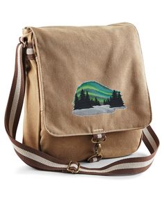 "Carry this embroidered Aurora Borealis Field Bag, whilst on your journey TRADITIONAL VINTAGE SAHARA BROWN CANVAS BAG * Weight 480g * Washed Canvas Fabric * Adjustable shoulder strap * Sturdy antique brass effect fittings * Internal valuables pocket * Zippered rear pocket * Two-tone webbing details * Bag Size - 34 x 29 x 10cm * Embroidery Size 8.90\" wide x  5.83\" high ( 226 x 148 mm)" Victorian Purses, Steampunk Bag, Gothic Bag, Field Bag, Tech Bag, Cute Patches, Embroidered Canvas, Embroidered Bag, Brown Canvas