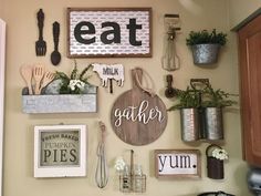 a kitchen wall filled with lots of different types of utensils and other items