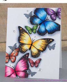 a card with colorful butterflies on it