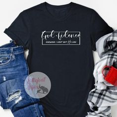 a black t - shirt with the words end friends on it next to ripped jeans