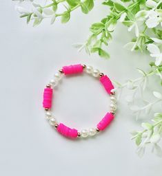 This bracelet is super cute and is inspired by barbie Trendy Pink Beaded Bracelets For Party, Cute Pink Bangle Charm Bracelet, Trendy Pink Jewelry With Bracelet Strap, Elegant Pink Charm Bracelet For Friendship, Elegant Pink Friendship Bracelets, Elegant Pink Friendship Charm Bracelet, Pink Bangle Bracelets As Gift, Pink Bangle Bracelets For Gifts, Pink Bangle Bracelets For Gift