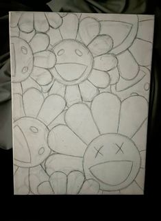 this is a drawing of some flowers on a piece of paper that has been drawn