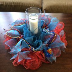 a candle sitting on top of a wooden table