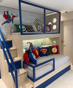 a kid's bedroom with a bunk bed and stairs