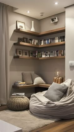 a living room with a bean bag chair and bookshelves on the wall behind it