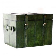 a large green leather trunk with two handles