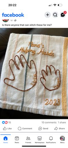 a hand towel has been embroidered onto it