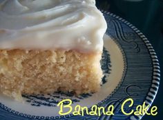 a close up of a piece of cake on a plate with icing in the middle