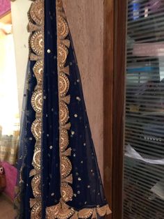 Blue net dupatta with sequin embroidery all over and scallop border on all sides. More dupatta here in our collection https://www.etsy.com/shop/neelcreations/?section_id=15880219 Beautiful net with sequin motifs all over dupatta. Indian dupattas for every occasion. ★ It can be made in other colors. ★We can increase its length also. Approximate length is 95 inches but if you want we will increase it. Please contact us for increased length. It has golden border scallop design. Perfect head wrap. T Indian Dupatta, Dupatta Border, Scallop Design, Scallop Border, Golden Border, Sequin Embroidery, Net Dupatta, Sequins Embroidery, Head Wrap