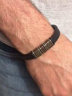 "Men's Leather Wrap  Bracelet  This bracelet is made from 100 % real leather. Size: 8.5\" long including the Clasp. Clasp is heavy Metal.  Band color is black." Men Leather Bracelet, Men's Leather Bracelet, Mens Leather Bracelet, Bracelet Black, Metal Band, Leather Wrap Bracelet, Braided Bracelets, Leather Wraps, Bracelets For Men