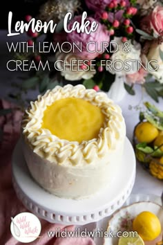 a lemon cake with lemon curd and cream cheese frosting on a white plate