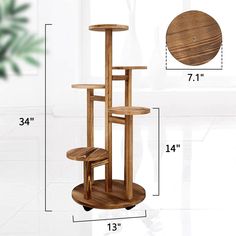 a wooden cat tree is shown with measurements for the top and bottom shelves on it