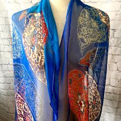 Beautiful, bright silk scarf in good vintage condition with no known issues.  Please examine pictures carefully before purchasing.  All items are sold as is. Blue Vintage Silk Scarf For Gift, Vintage Blue Silk Scarf As Gift, Vintage Blue Silk Scarf For Gift, Blue Paisley Print Bohemian Scarf, Blue Bohemian Paisley Print Scarves, Blue Bohemian Scarf With Paisley Print, Traditional Blue Scarf As Gift, Vintage Blue Scarf One Size, Blue Vintage Silk Scarf