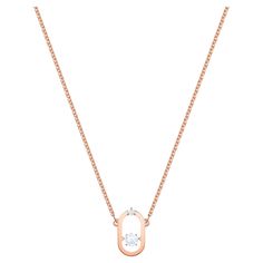 a rose gold necklace with a white diamond in the center and an open circle pendant