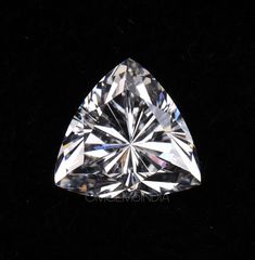 a diamond cut in the shape of a triangle