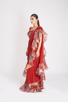 Kinfolk fiery red printed embellished organza ruffle with mulberry crepe stitched saree & organza blouse.From Aisha Rao's Kinfolk collection. DELIVERY TIMEPlease allow 6-8 weeks for your outfit to arrive. FABRIC DETAILSOrganza Professional cleaning only. Festive Red Pre-draped Saree With Printed Motifs, Festive Silk Chiffon Pre-draped Saree, Pre-draped Georgette Saree With Printed Motifs For Navratri, Navratri Pre-draped Georgette Saree With Printed Motifs, Festival Georgette Pre-draped Saree With Printed Motifs, Festival Pre-draped Georgette Saree With Printed Motifs, Festive Red Saree With Floral Print, Festive Pre-draped Silk Chiffon Saree With Sheer Dupatta, Semi-stitched Ruffled Saree For Festivals