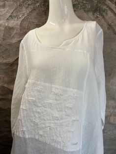 Step up your style game with the LT1297 Top! Crafted from breathable 100% linen, this versatile top is perfect for any season. Show off your fashion courage with this daring yet sophisticated look. Chic White Linen Tops, Casual White Linen Blouse, White Cotton Lagenlook Blouse, White Casual Ramie Blouse, Casual Ramie Tops For Daywear, White Linen Tops For Spring, White Lagenlook Blouse With Relaxed Fit, White Ramie Top For Spring, Linen Lagenlook Tops For Daywear