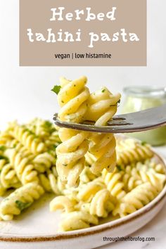 a fork full of pasta with the words herb tahitii pasta on it and an image of broccoli in the background