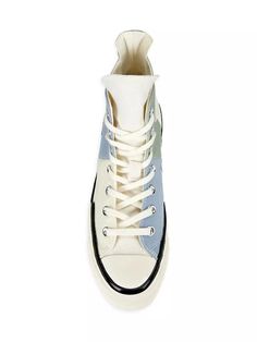 Designed with a pieced upper, Converse’s iconic Chuck 70 Plus sneakers splice texture and color to update the iconic high-top silhouette..Recycled textile upper.Round toe.Lace-up vamp.Canvas lining.Padded insole.Rubber sole.Imported.SIZE.Unisex sizing, runs a half-size large.This brand fits slightly larger. Consider ordering half a size down..Designed with a pieced upper, Converse’s iconic Chuck 70 Plus sneakers splice texture and color to update the iconic high-top silhouette.Recycled textile u Retro Converse High-top Sneakers With Laces, Retro Color Block Sneakers For Spring, Retro Spring Color Block Sneakers, Retro High-top Sneakers With Contrast Sole Lace-up, Retro High-top Sneakers With Laces, Retro Converse High-tops With Rubber Toe Cap, Retro Converse High-top Sneakers With Rubber Toe Cap, Spring High-top Sneakers With Rubber Toe Cap, Retro High-top Sneakers With Vulcanized Sole